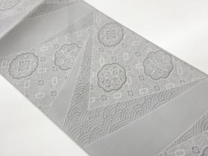 本綴れ切り嵌め風花々に波・縞模様織出し名古屋帯